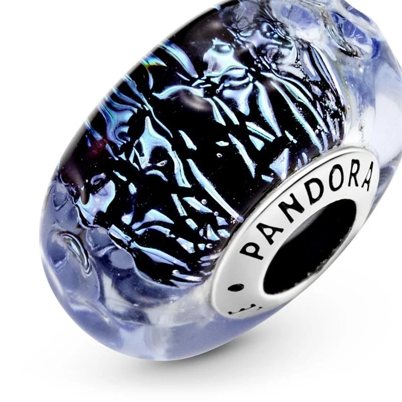 Wavy sterling silver charm with iridescent and dark blue Murano glass