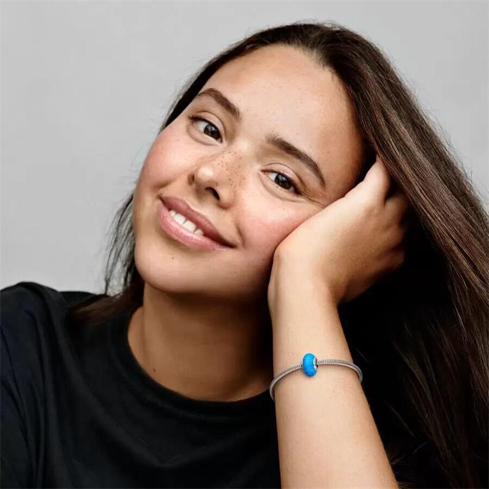 Sterling silver charm with deep blue lab-created opal