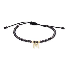 Pulsera Marina Gacía Nylon Negro, Piedras Espinelas Negras y Letra "M" Oro Amarillo 18Kt A2625AM
