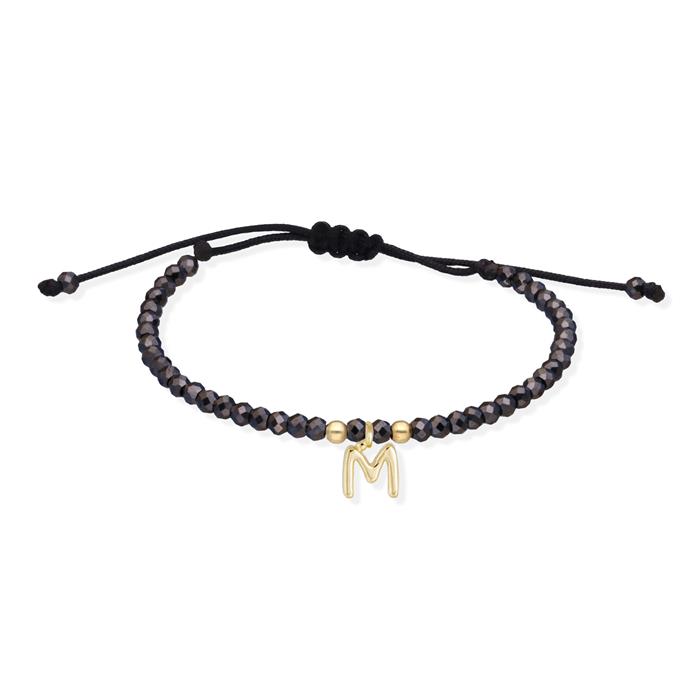 Pulsera Marina Gacía Nylon Negro, Piedras Espinelas Negras y Letra "M" Oro Amarillo 18Kt A2625AM