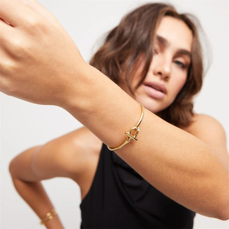 Pulsera UNOde50 Ser Indomable Baño Oro y Topacio Blanco PUL2449BLNORO0M