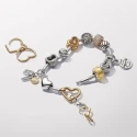 Pendientes Pandora Corazón Asimétrico Baño Oro 268307C00