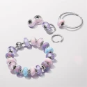 Sterling silver charm with lavender purple lab-created opal